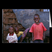 kids playing Kibera cards