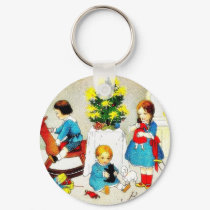 Kids playing with toys and christmas tree keychains
