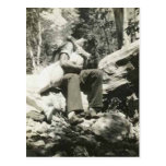 Kissing in the woods post card