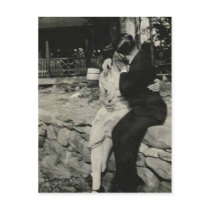Kissing on the stone wall post card