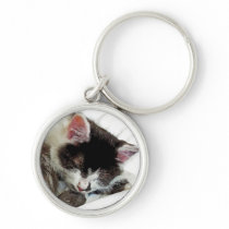 Kitten asleep on White Comforter Key Chains