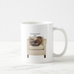 Kitty sleeping in a chair mug