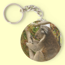 Koala bear sleeping on a tree keychains