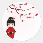 Kokeshi doll under sakura branch round stickers