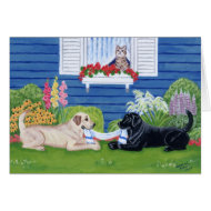 Labradors playing in the garden card