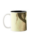 lady in black hat enlarged mug