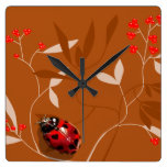 Ladybug heart shaped spots on red berry clock