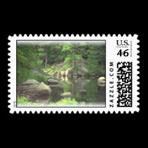 Lake with rocks postage stamp stamps
