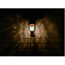lamp with angel wings reflection on wall cut out