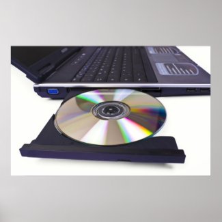 laptop computer with open optical disk drive posters