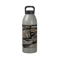 Large and Small Stones in a Wall Drinking Bottle