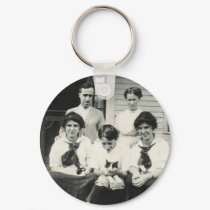 Large family holding cats keychains