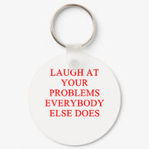 LAUGH at your problems keychains