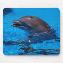 “laughing dolphin” by m^ysteryella mousepads