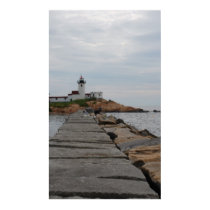 Lighthouse on a cloudy day posters