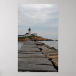 Lighthouse on a cloudy day posters