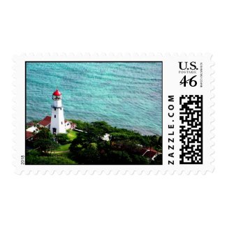 Lighthouse on the ocean stamp