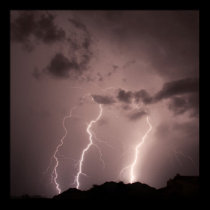 Lightning strikes the mountains posters