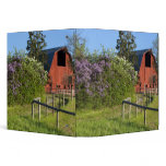Lilac bushes in bloom and magpies in the trees binders