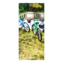 Line of Bicycles in Park Full Color Rack Card