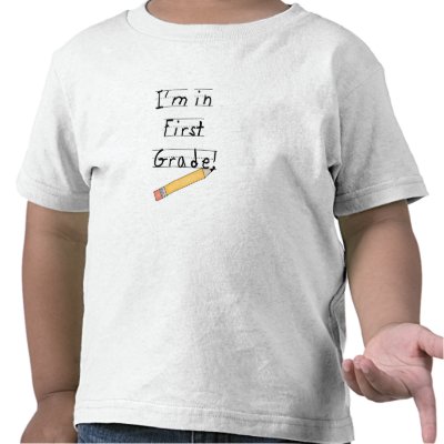 lined paper and a big yellow pencil with kid style text that reads quot;i#39;m in first grade quot; on first grade student t shirtsschool tote bagsstickers 