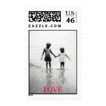 Little boy and girl holding hands...in love postage