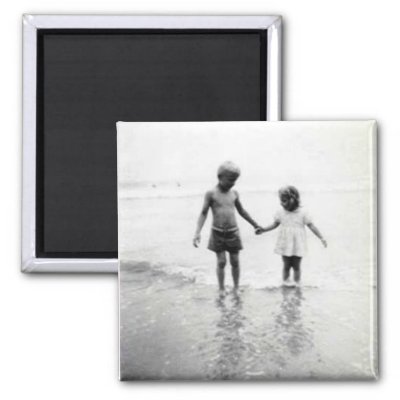 Little Boy And Girl Holding Hands In Black And White. Little boy and girl holding
