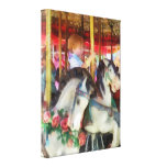 Little Boy on Carousel Canvas Prints