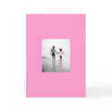 little girl and boy holding hands greeting card