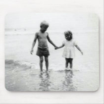 Little girl and boy holding hands mousepad