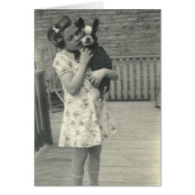 Little girl holding her dog greeting card