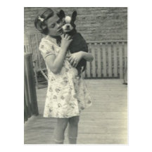 Little girl holding her dog post card