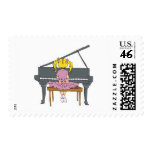 little girl playing piano postage stamp