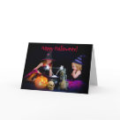 postcard - These adorable little witches are conjuring fairies n their magical cauldron.  Text reads, "Happy Halloween" on the front of the card and "Hope you have a magical Halloween," on the inside.  Let your friends know you hope they have fun this Halloween with this creative and unique Halloween card.