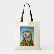 Little hedgehog on a big pile of leaves bags