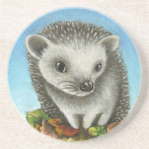 Little hedgehog on a big pile of leaves coasters