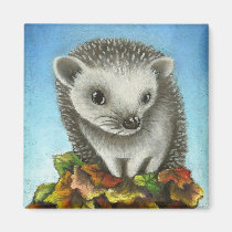Little hedgehog on a big pile of leaves magnets