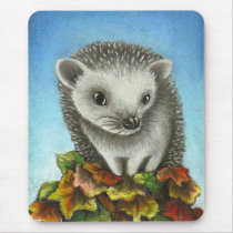 Little hedgehog on a big pile of leaves mousepads