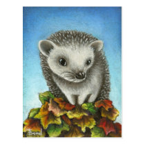 Little hedgehog on a big pile of leaves postcards