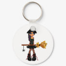 round_keychain - Little witch with her broom.