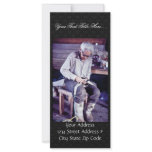 Local resident working on dog sled harness full color rack card