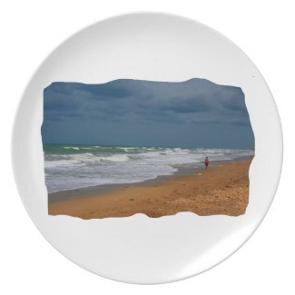 Lone Man Walking on Stormy Beach Cropped plate