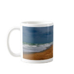 Lone Man Walking on Stormy Beach Mug