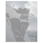 Lone snow skier on top of large rock edge Winter Customized Letterhead