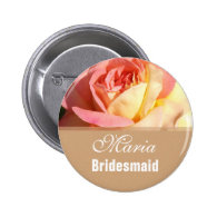 Lovely pink and yellow flower wedding name button.