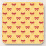 Lovely Red Bows on Golden Color Background. Drink Coasters