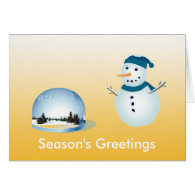 Lovely snowman and snowy world seasons greetings card