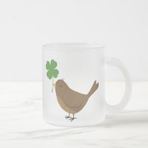 Lucky bird holding a four leaf clover mug