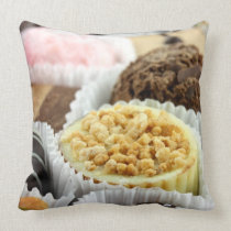 Luxury individual chocolates in cases closeup throw pillows