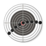 Machine gun bullet holes over target magnets